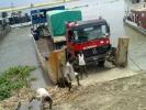 Trojan Trucks Crossing The River In Malakal Port